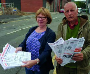 Sue Auckland and Steve Ayris with some of the hundreds of responses to the Lib Dem petition to save local buses